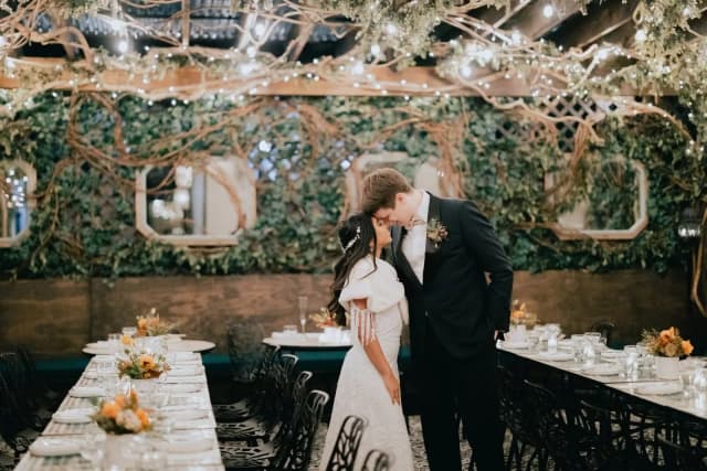 Couple celebrating their wedding in the Secret Garden