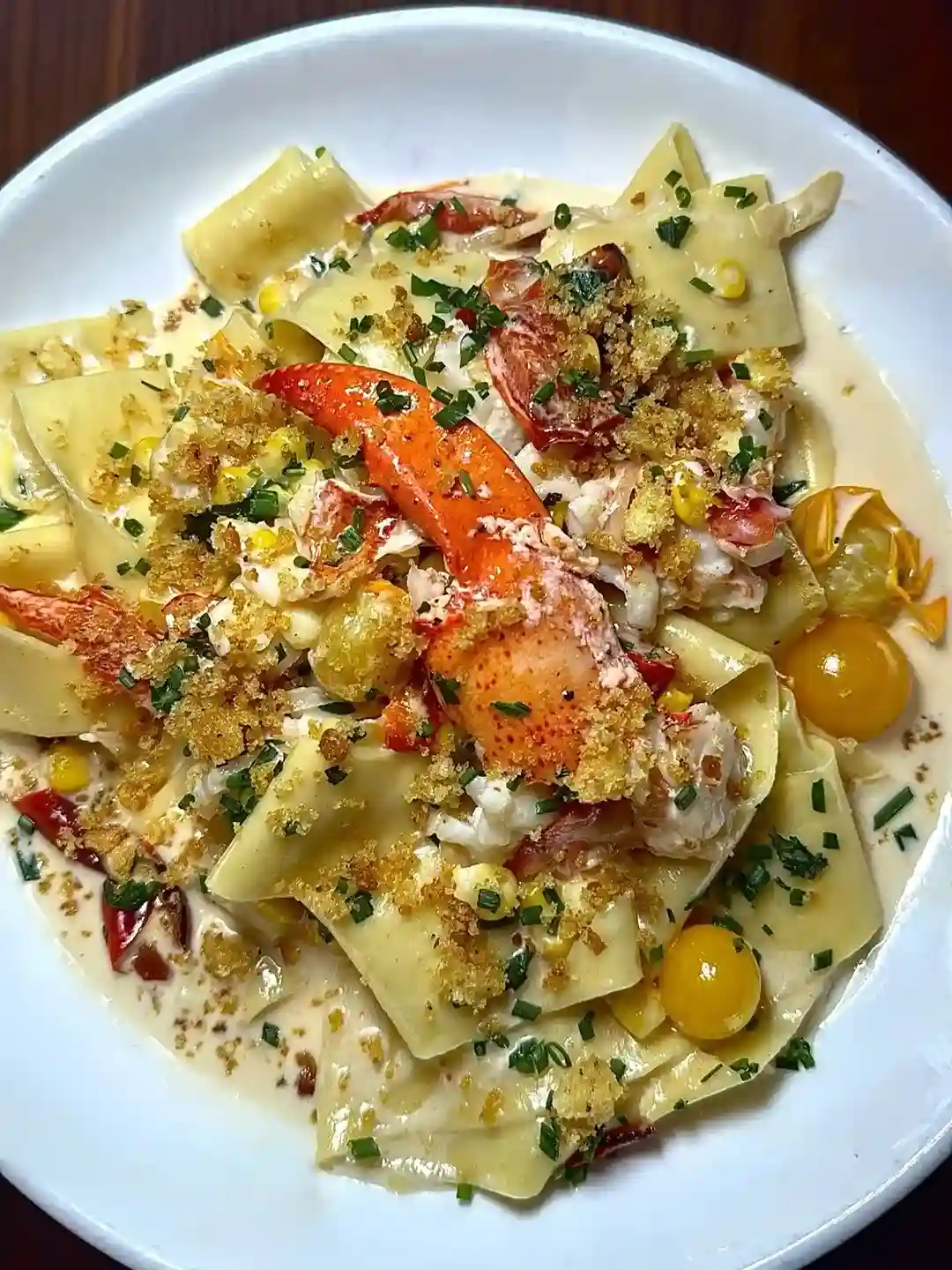 Lobster pasta with cherry tomatoes and toasted breadcrumbs