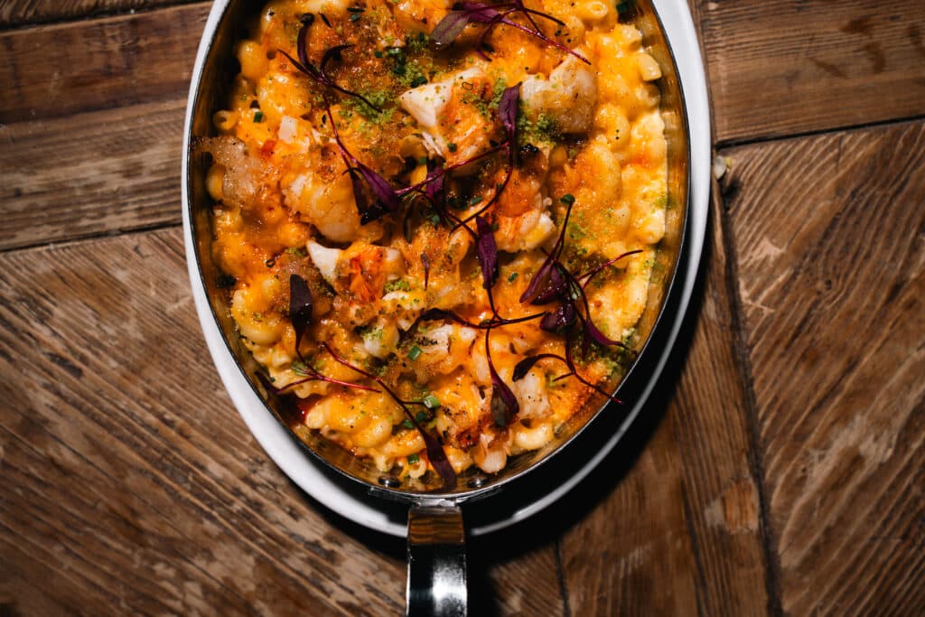 Shareable skillet dish from The Addison kitchen, available for catering in NYC