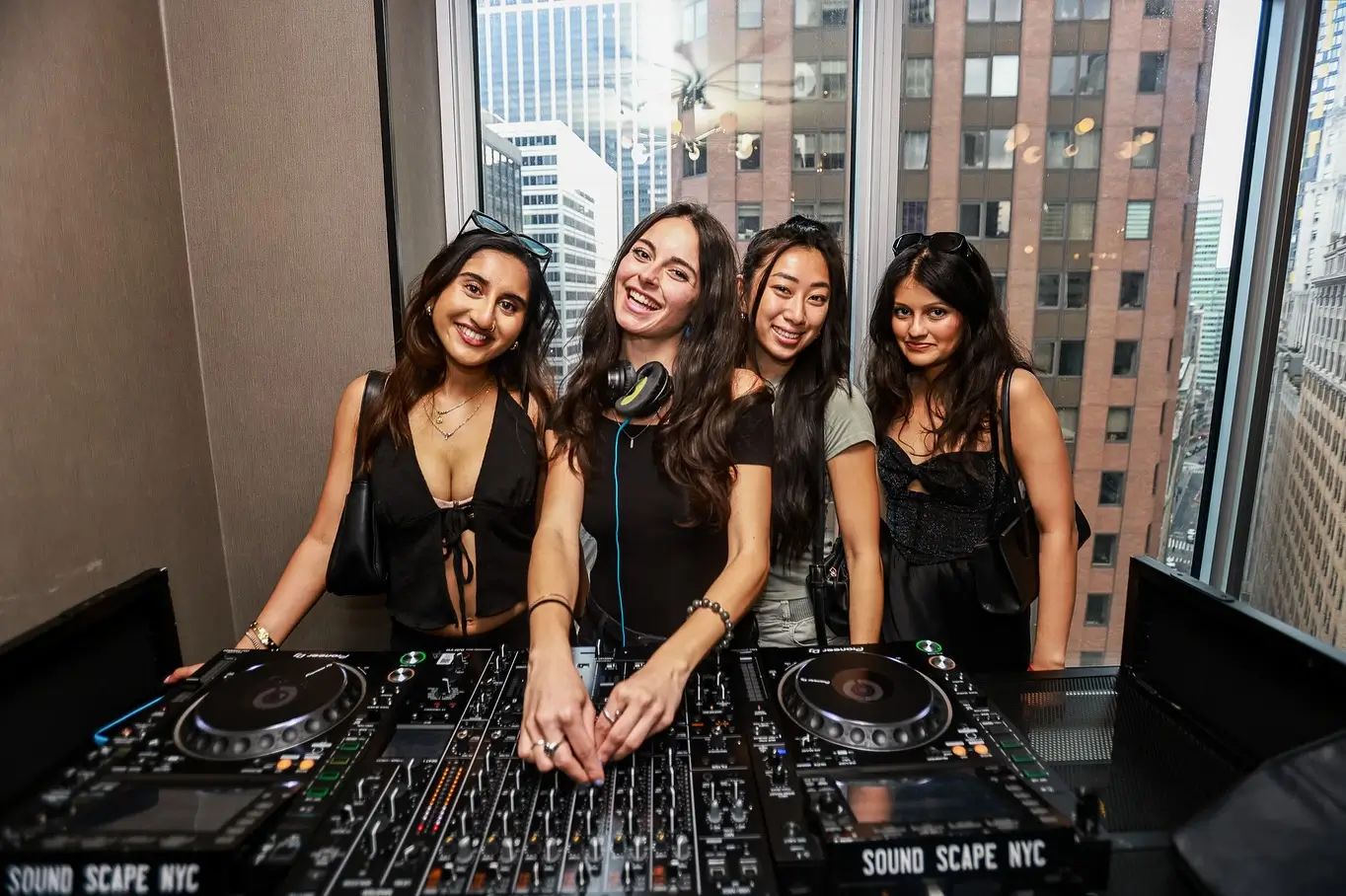 Friends celebrating at Highwater Rooftop